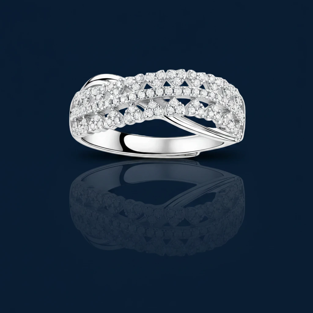 Sterling silver crossover ring with pavé-set moissanite stones creating an elegant infinity design on neutral background