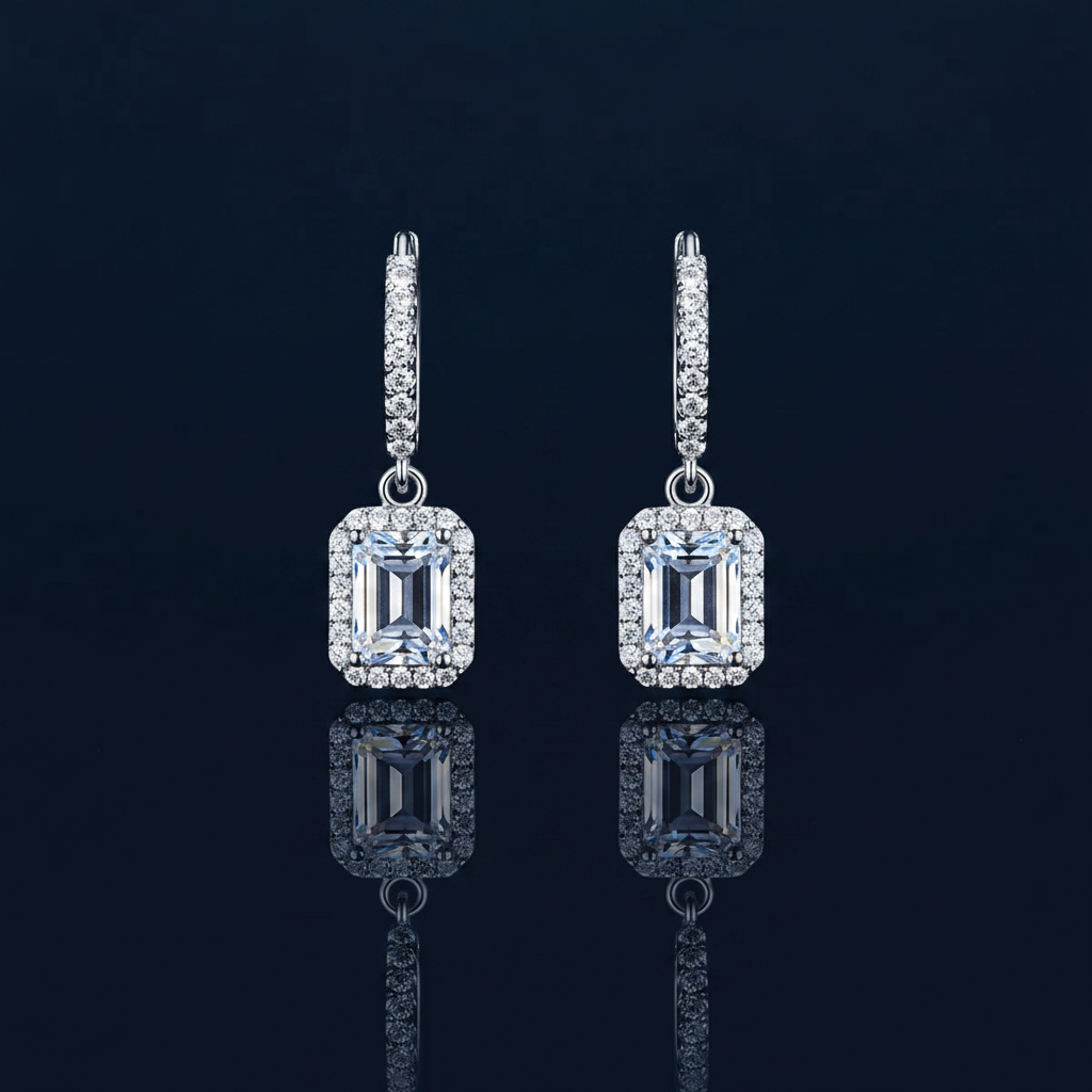 1 Carat Moissanite Emerald-Cut Halo Drop Earrings on navy blue background