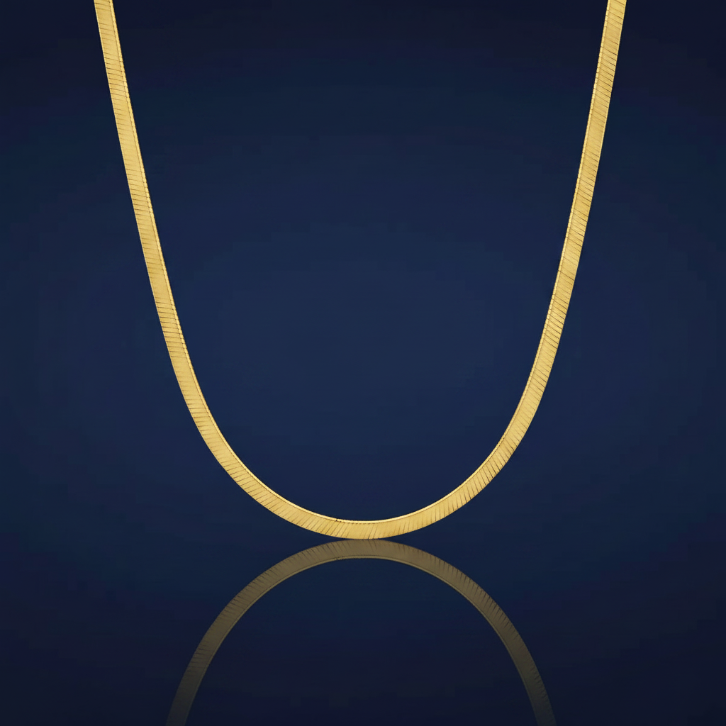 18K Gold-Plated Titanium Steel Flat Herringbone Chain Necklace on navy blue background