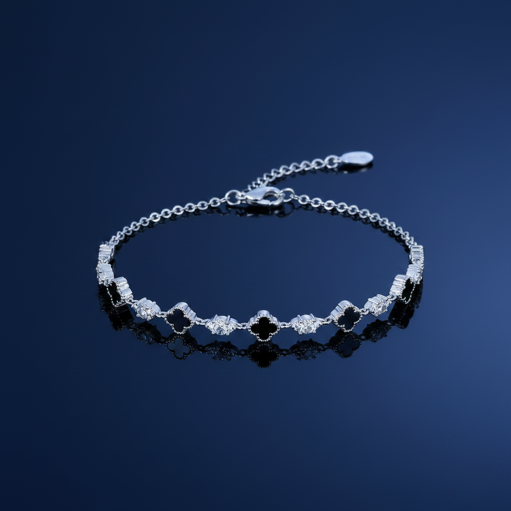 925 Sterling Silver Black Agate Clover Charm Bracelet on navy blue background