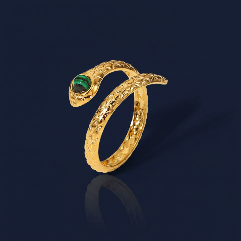 Gold Snake Charmer Bypass Ring with Malachite Stone on navy blue background